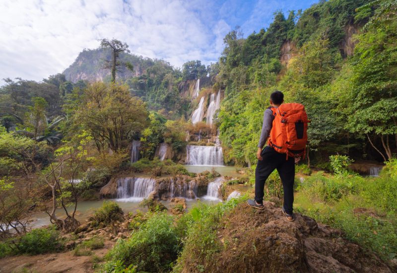 Asian,Man,,A,Tourist,Backpacker,,In,Thi,Lor,Su,Waterfall.