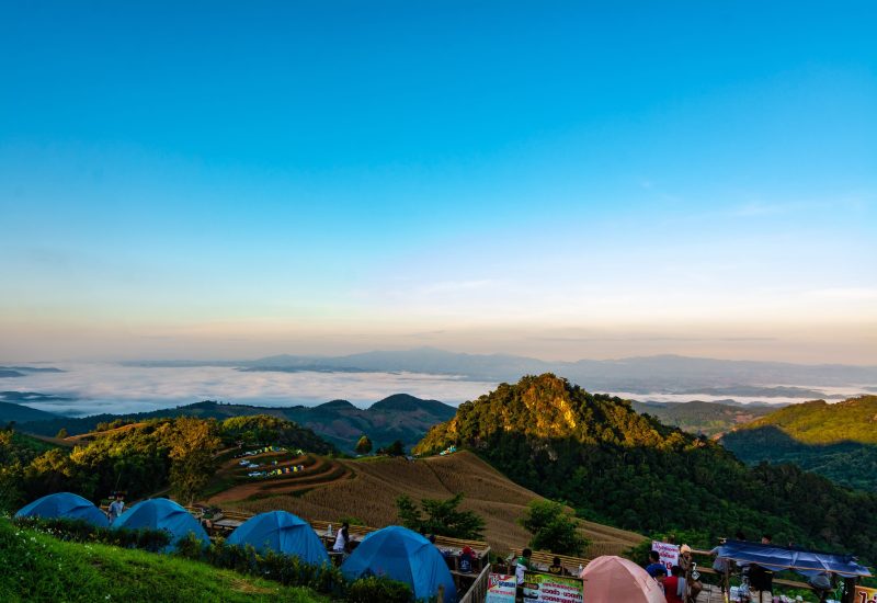 sunset overlooking mountains with Mist .